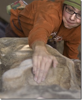 Sticking the crux on Beach (V4)