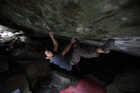 Dai Koyamada bouldering in Magic Wood